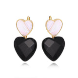 Earrings with a mother-of-pearl heart symbol and a black agate Heart pendant Gold